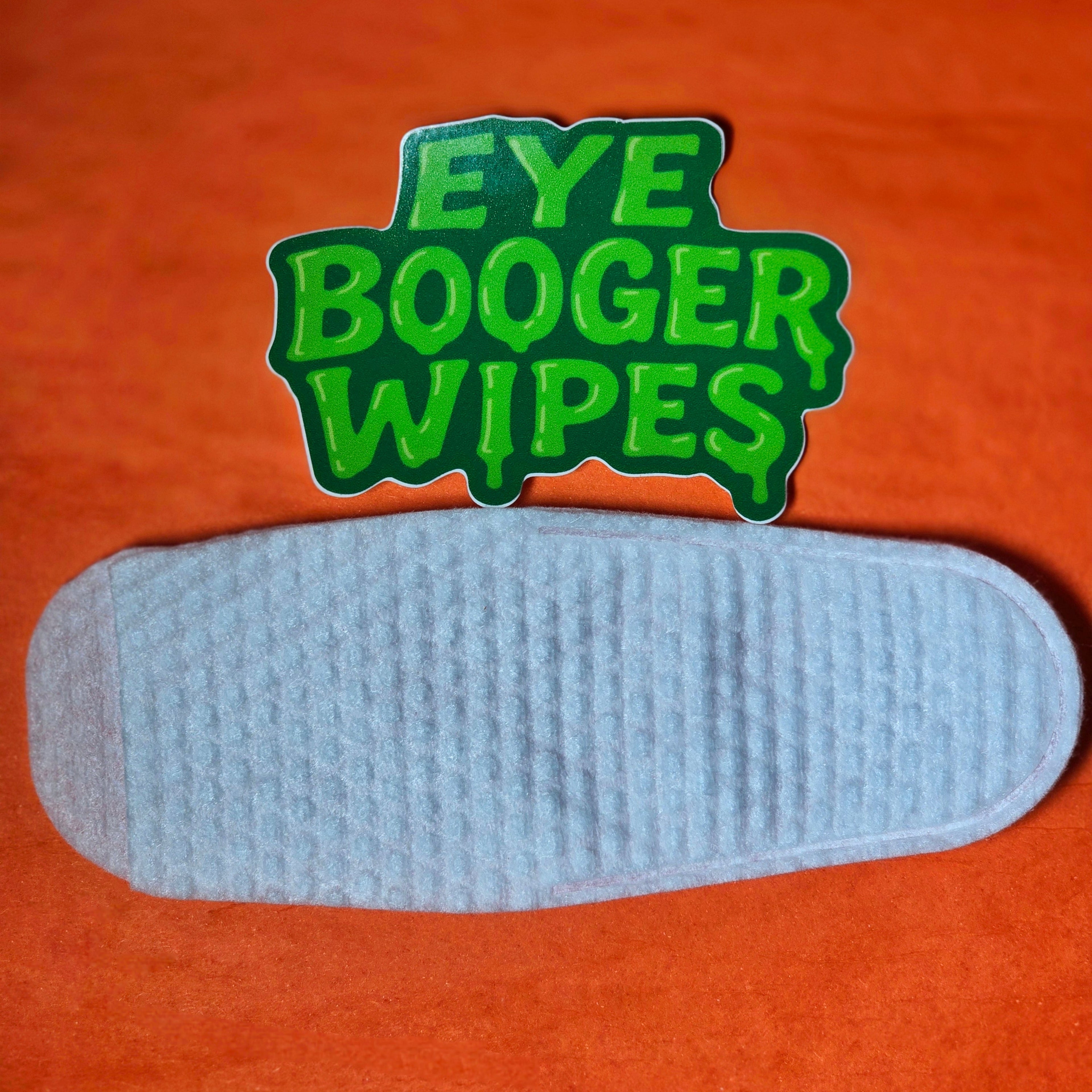 Eye booger wipes with green text on an orange background