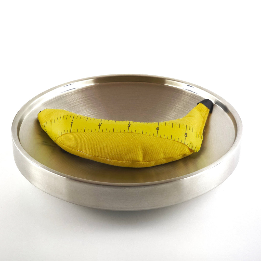 Yellow measuring tape on steel plater on a white background