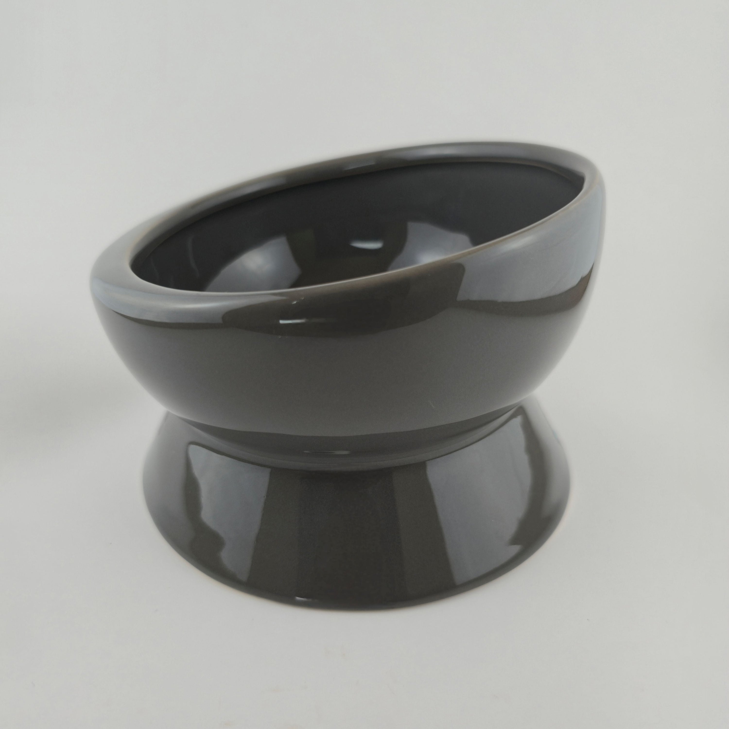 Gray ceramic bowl on a white background