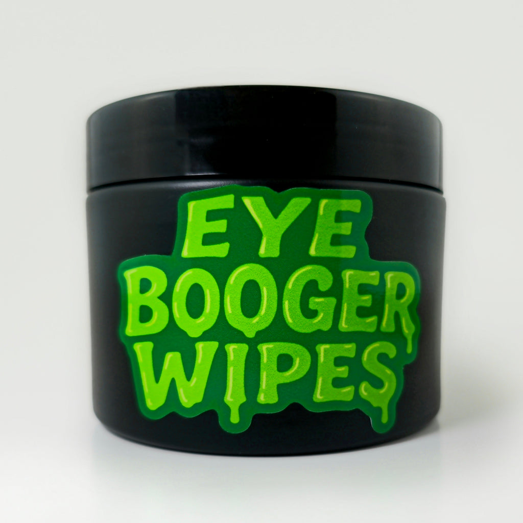 Black container with green text 'Eye Booger Wipes' on a white background